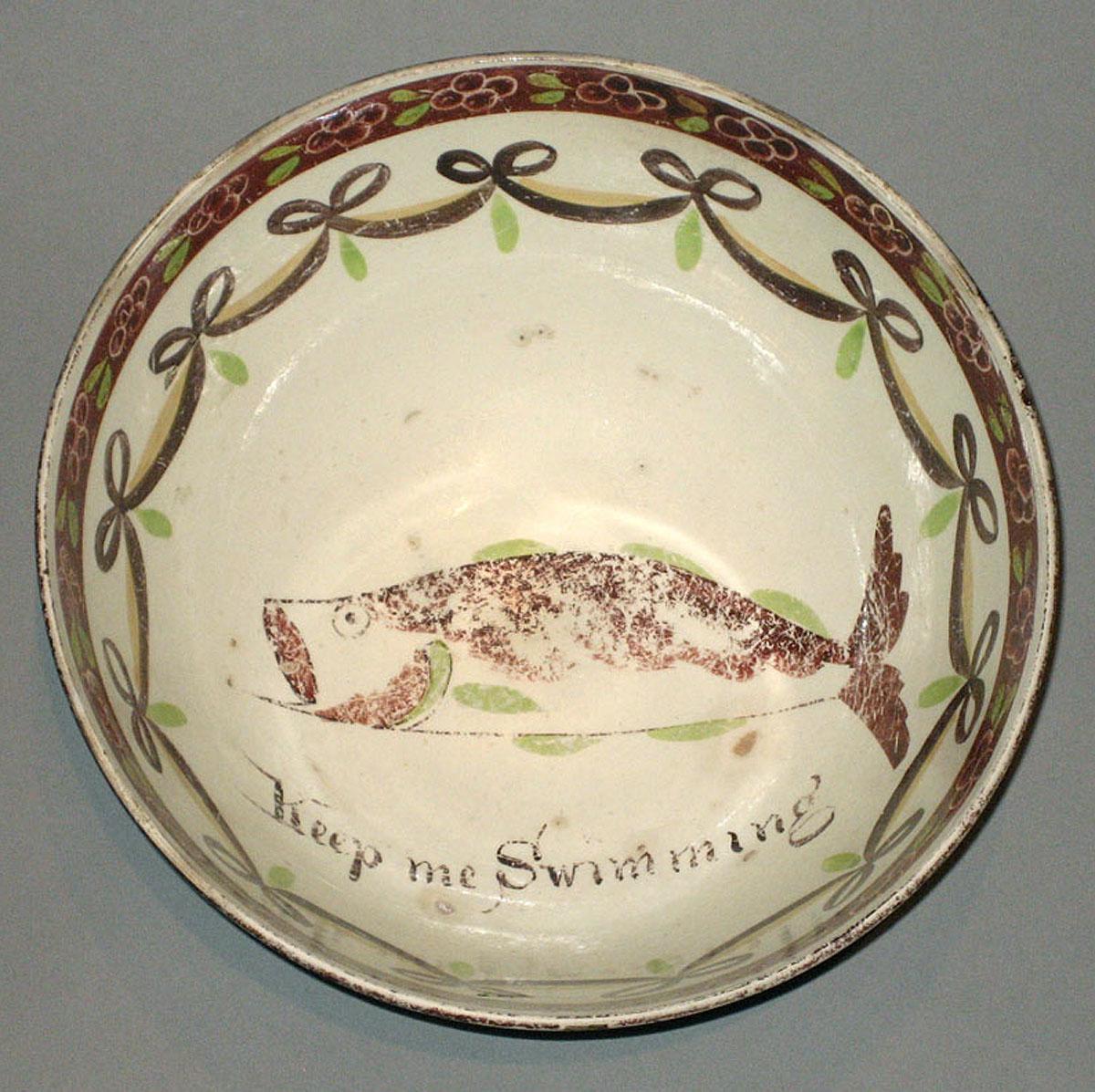 1967.0672 Creamware fish punch bowl