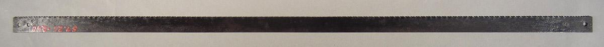 1957.0026.240 Saw blade, side 1