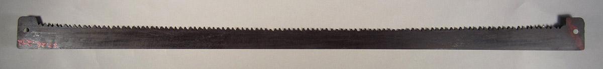 1957.0026.242 Saw blade, side 1