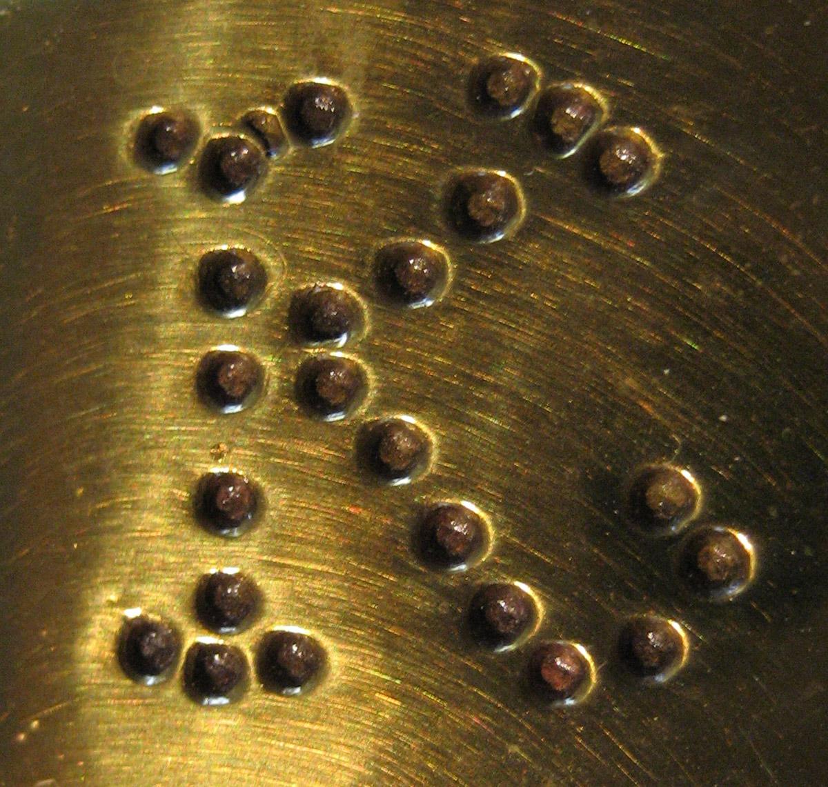 1967.0773 Chamberstick (inscription)
