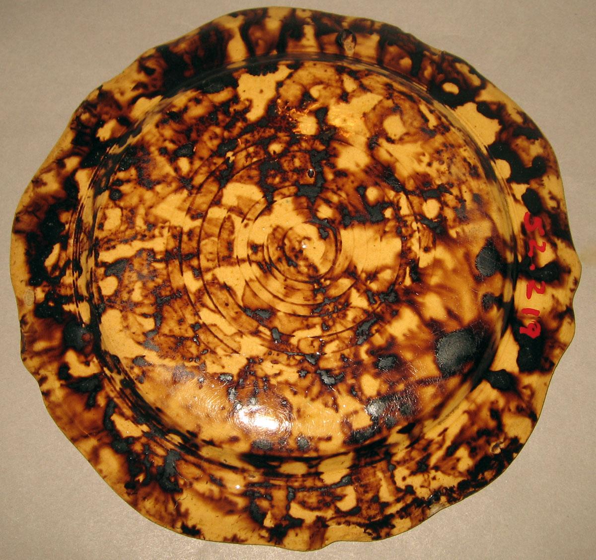 1952.0219 Creamware plate (underside)