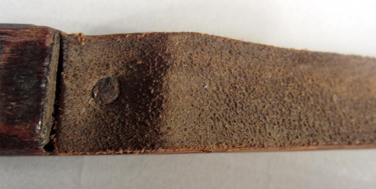 1957.0026.268 Leather strop, Detail