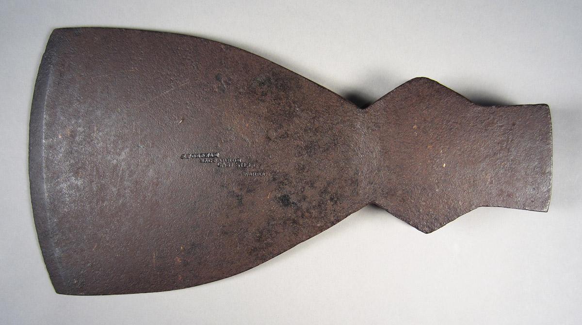 1957.0026.284 Axe head, side 1