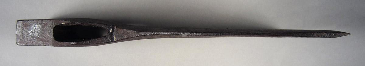 1957.0026.284 Axe head, side 3