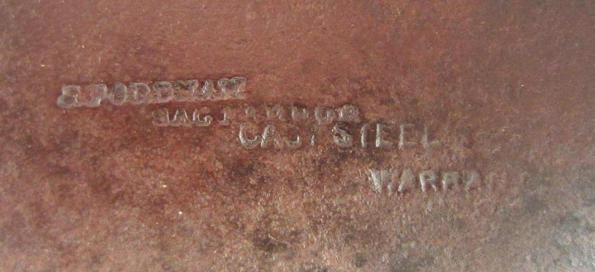 1957.0026.284 Axe head, mark
