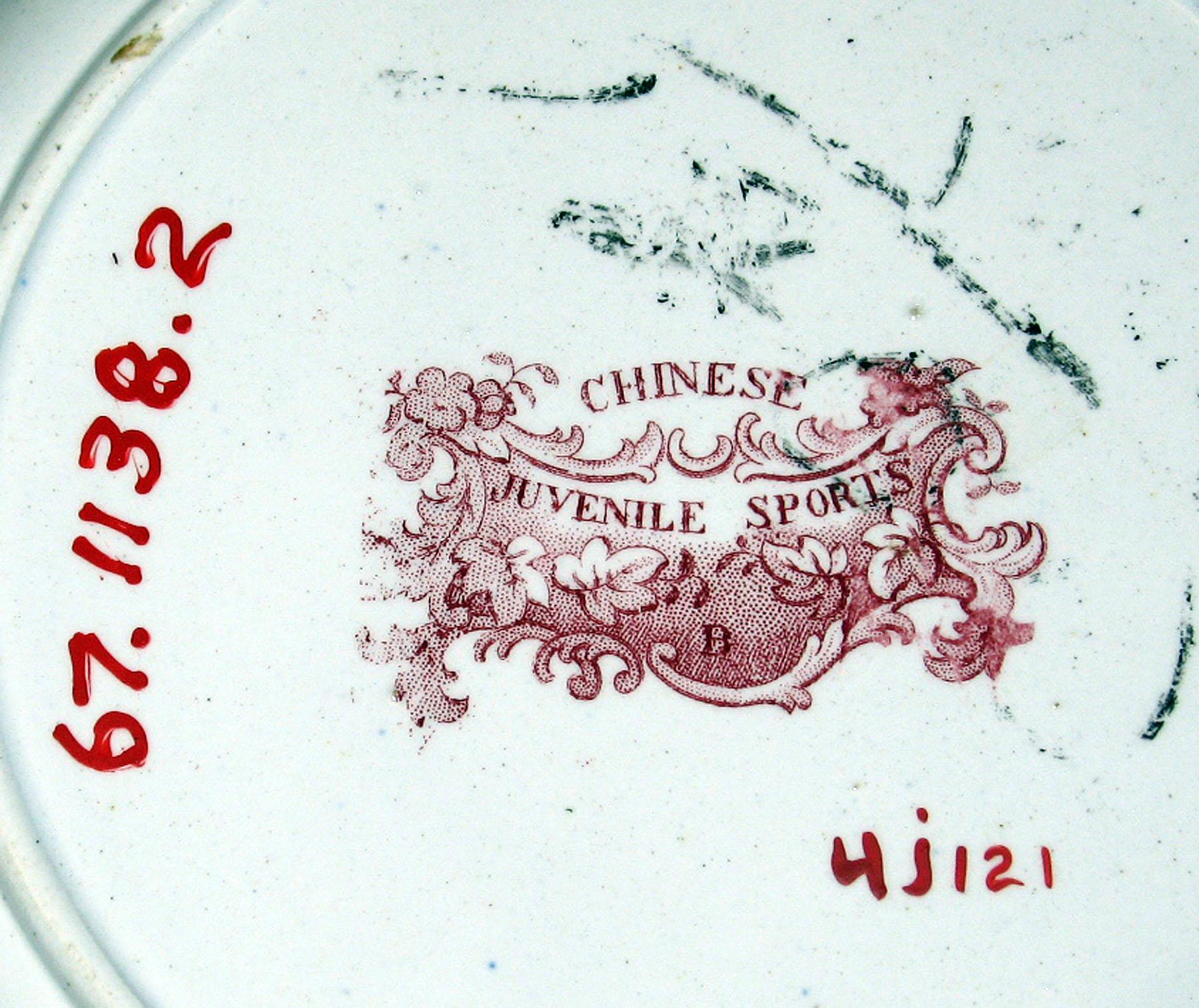 1967.1138.002 White earthenware plate, detail