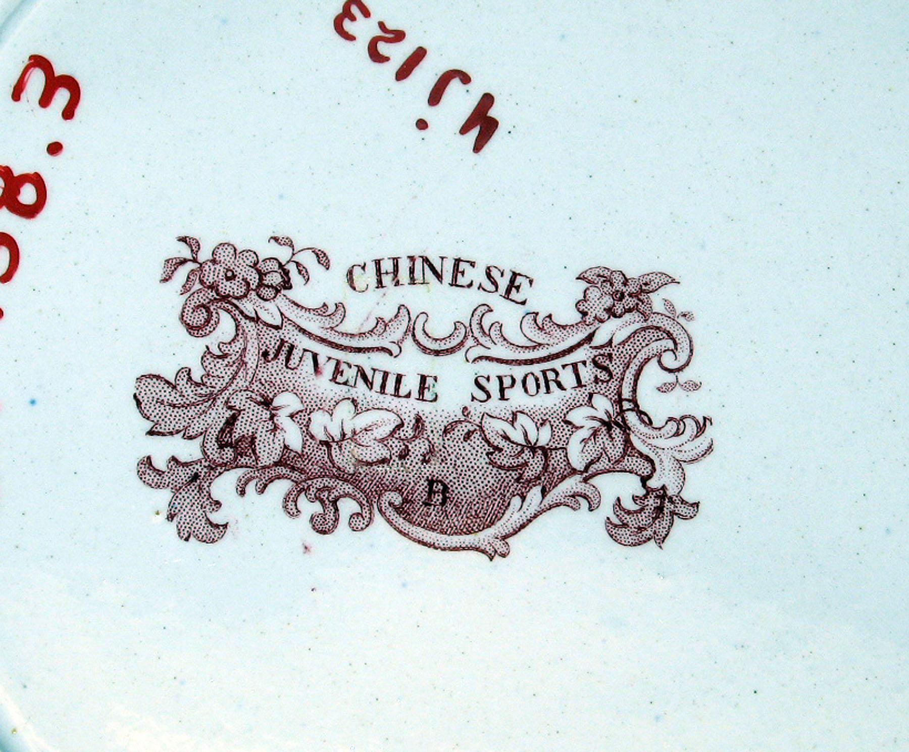 1967.1138.003 White earthenware plate, detail