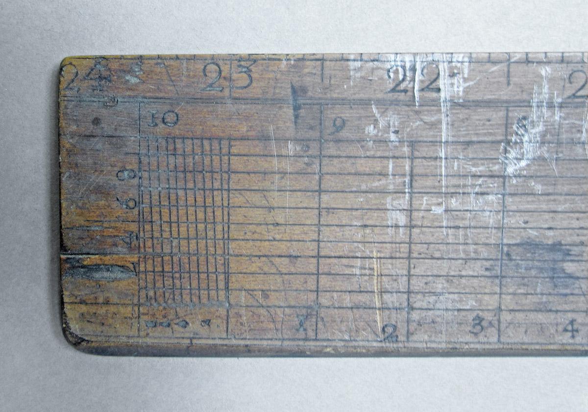 1957.0026.299, Rulers, large ruler side 1 detail 1