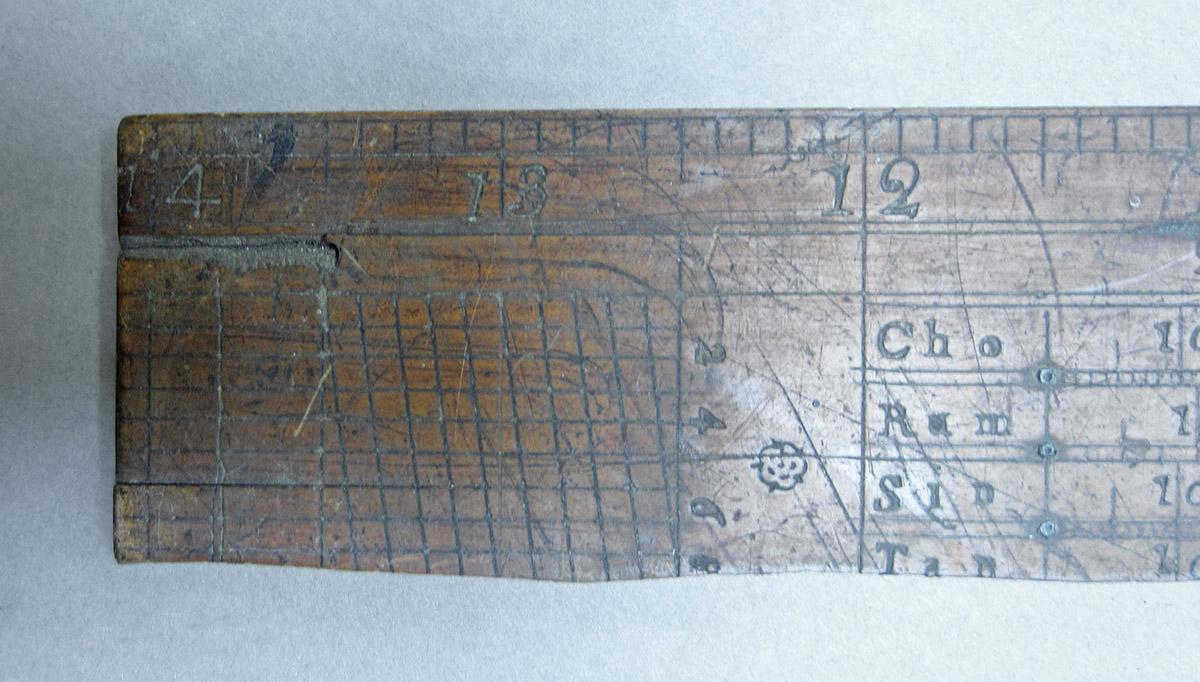1957.0026.299, Rulers, small ruler side 1 detail 1