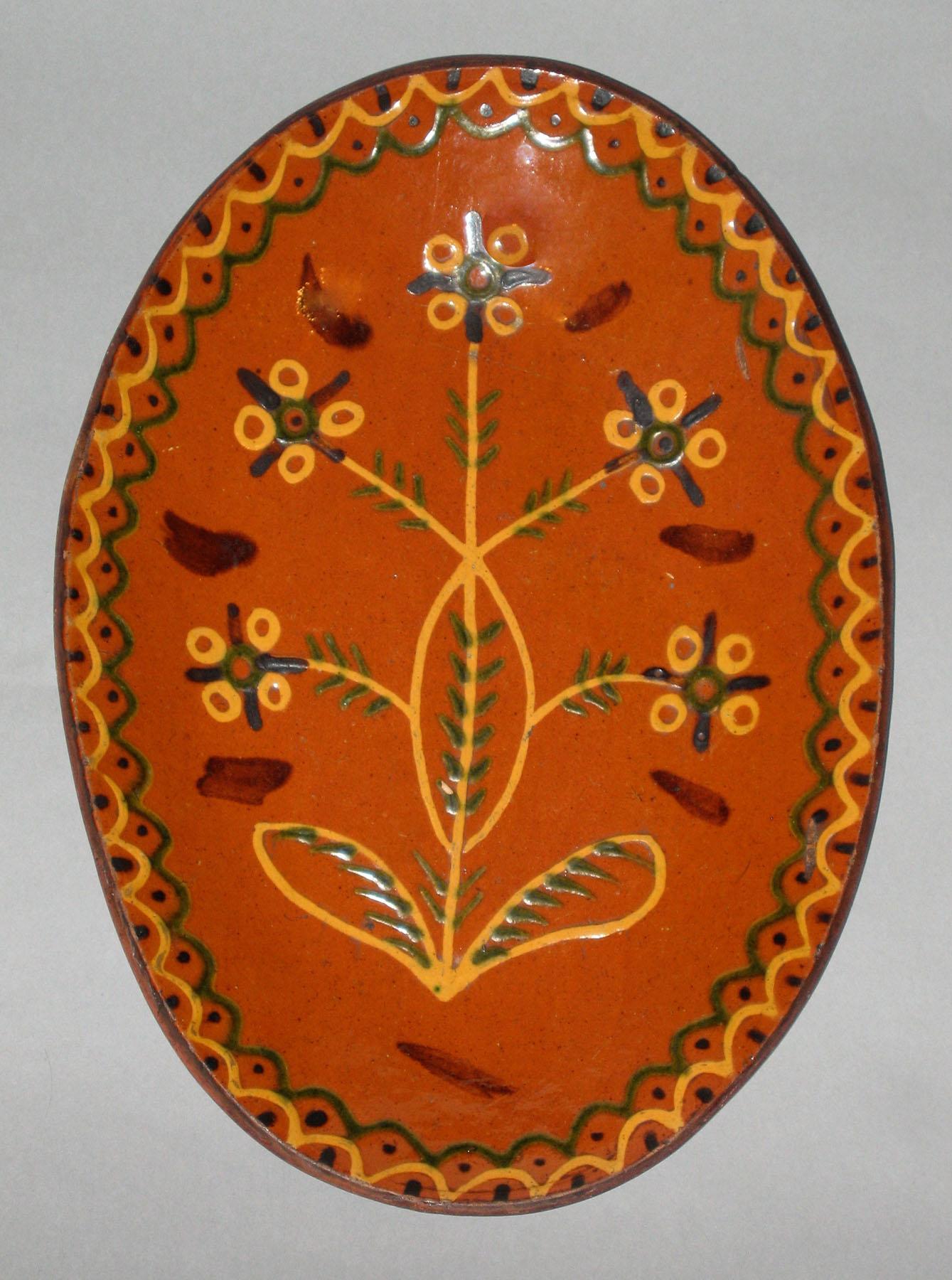 1967.1234 Trailed slipware dish