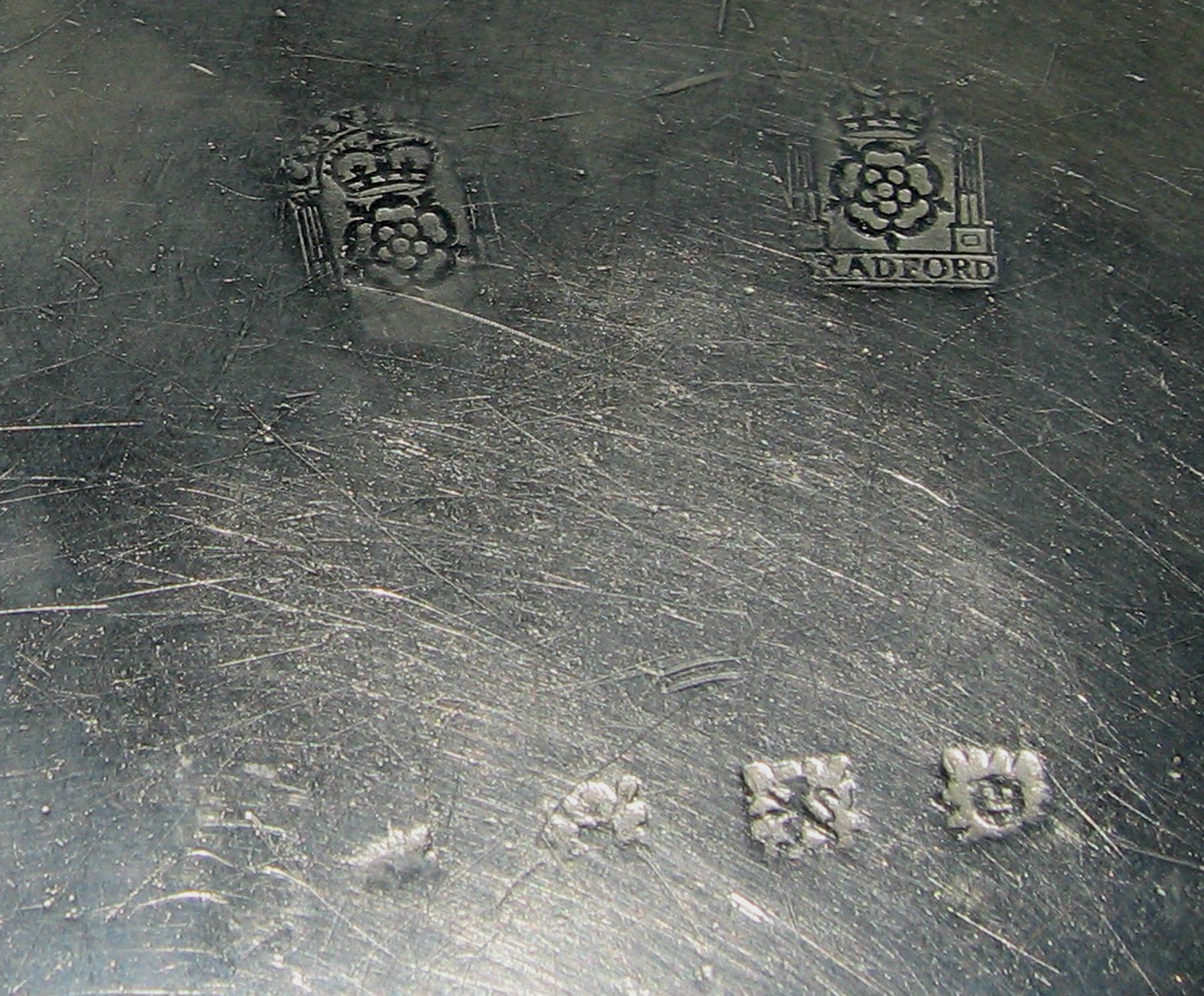 1967.1367 Pewter plate (marks)