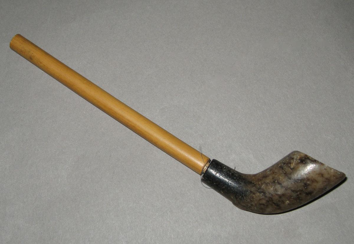 1967.1389 C Stoneware pipe bowl, bamboo stem