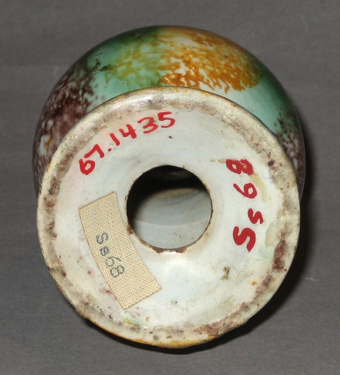 1967.1435 Caster (underside)