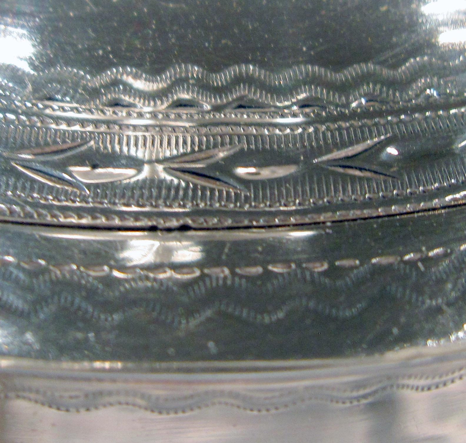 1967.1444 Silver Teapot lid decoration