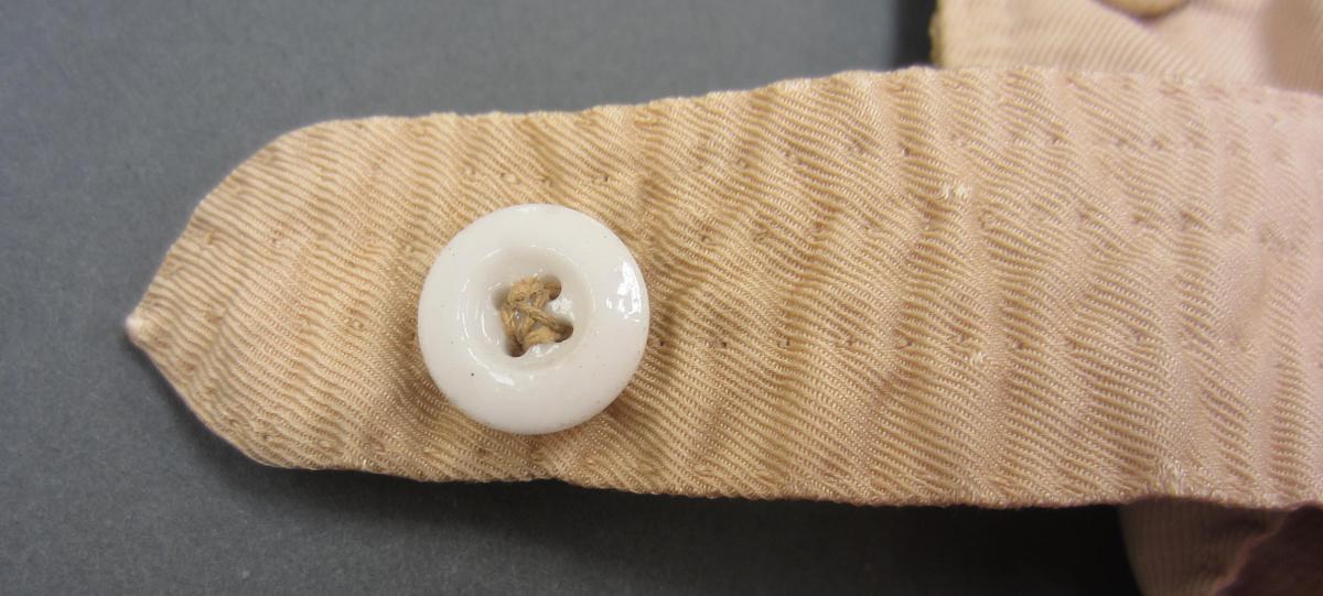 1967.1483 Breeches, Replaced button 1
