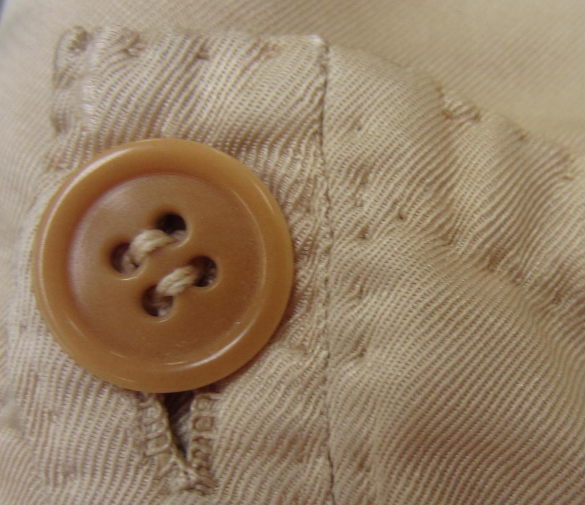 1967.1483 Breeches, Replaced button
