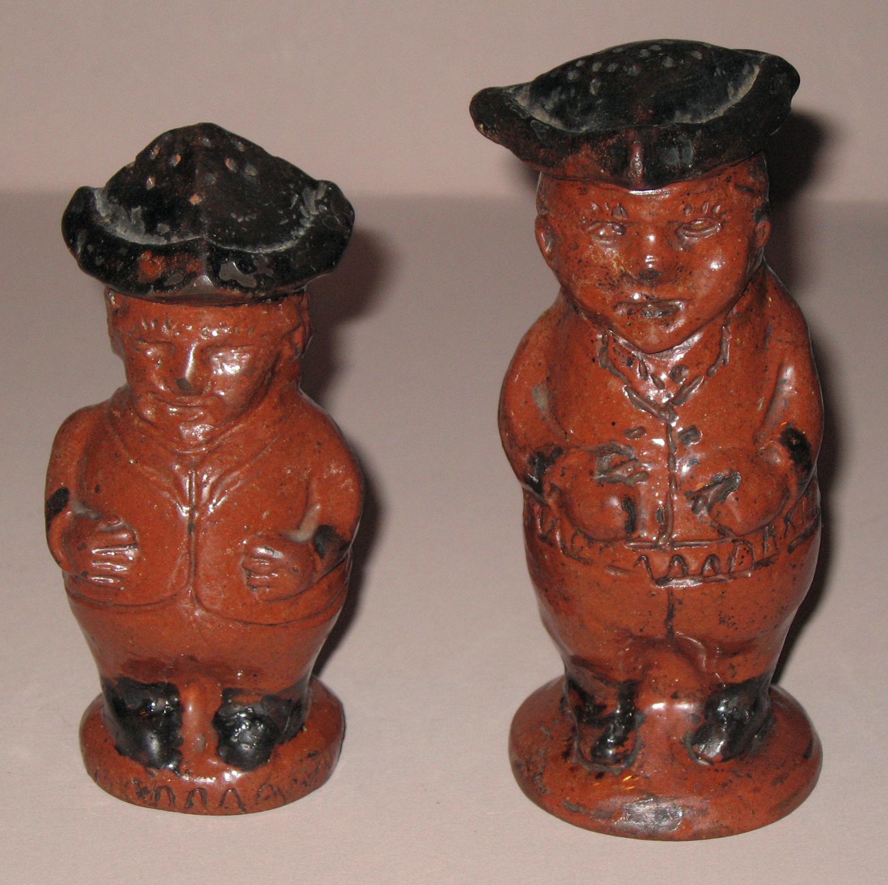 1967.1664, 1959.2208 Redware man-shaped casters