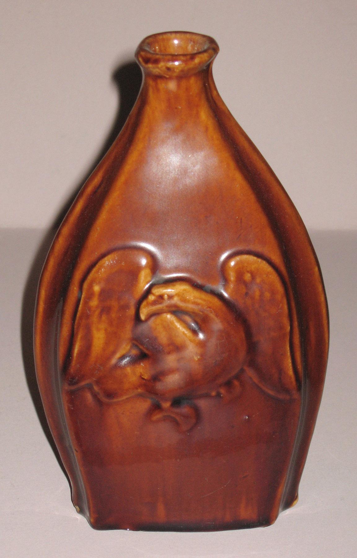 1967.1665 Earthenware eagle flask
