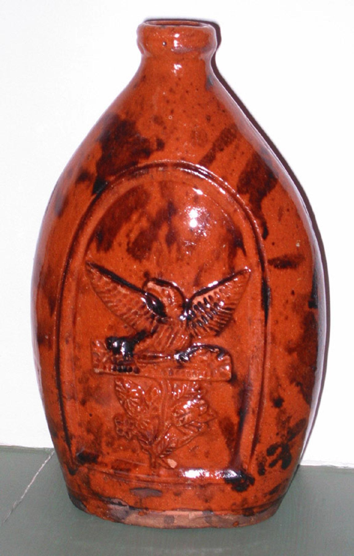 1967.1666 US redware eagle flask