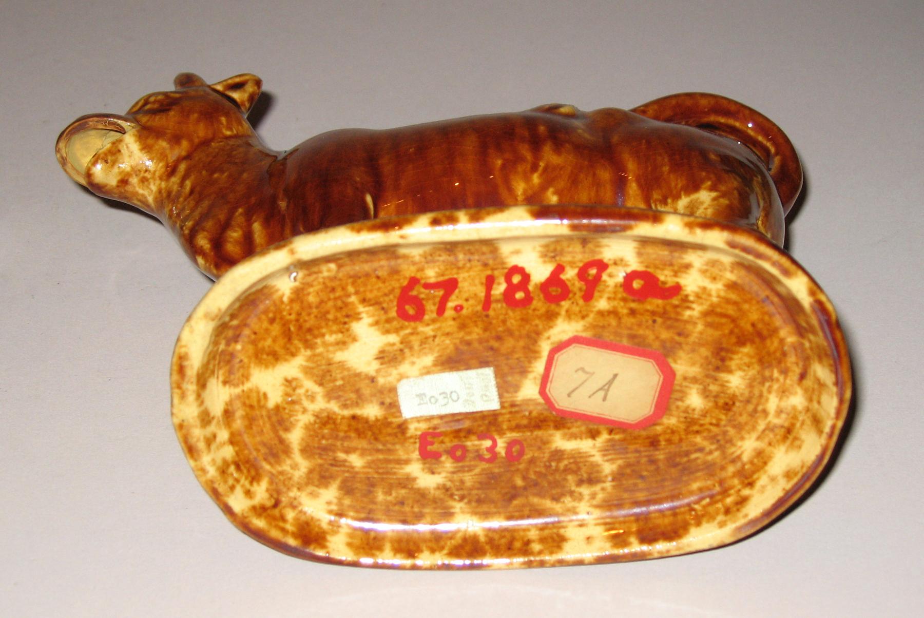 1967.1869 A, B Earthenware cow creamer (bottom)