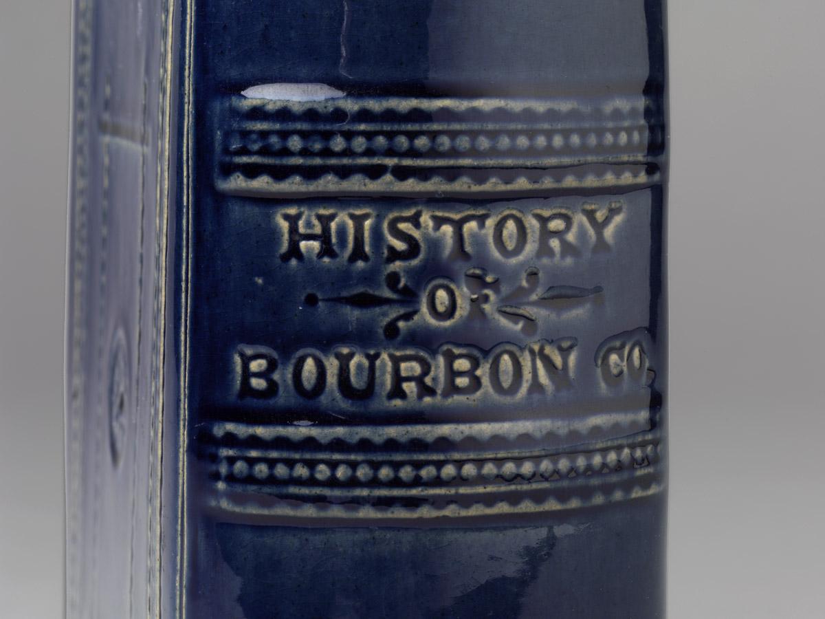 1967.1876 Book-shaped bottle (inscription detail)
