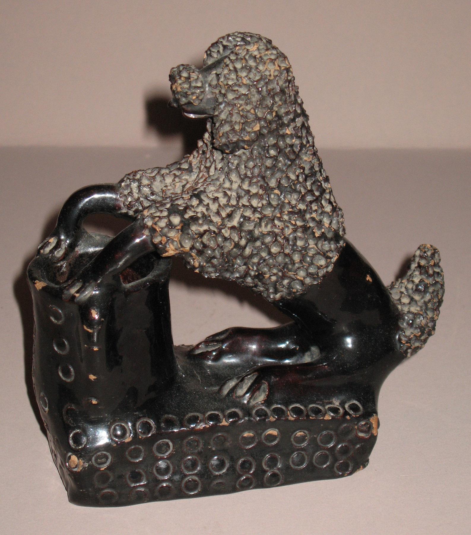 1967.1879 Earthenware (redware) dog (poodle)