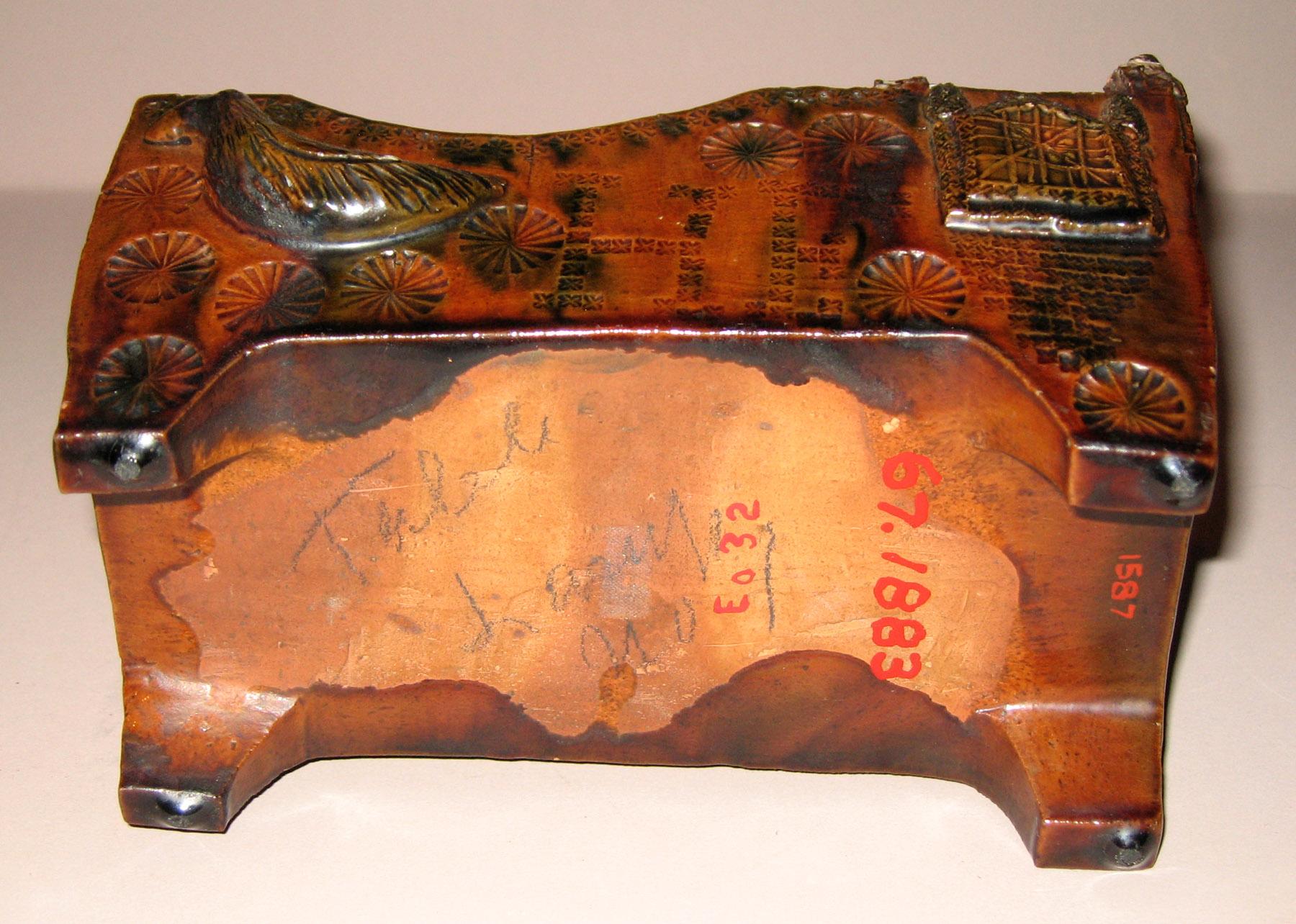 1967.1883 Redware cradle (bottom)