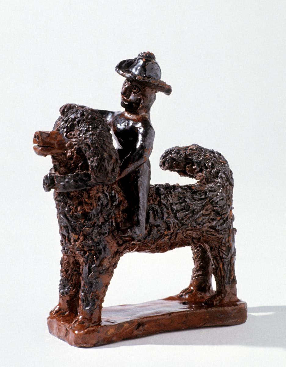 1967.1885 Earthenware (redware) man an dog