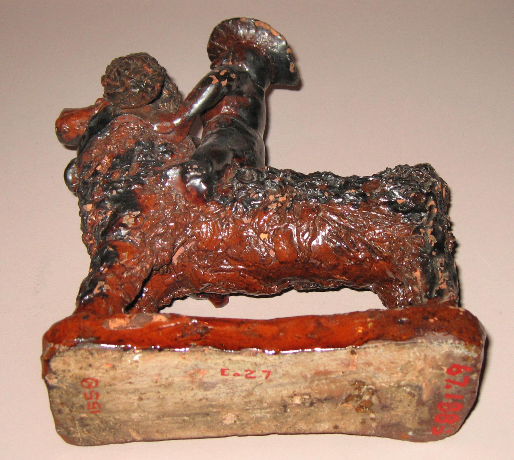 1967.1885 Earthenware (redware) man an dog (bottom)