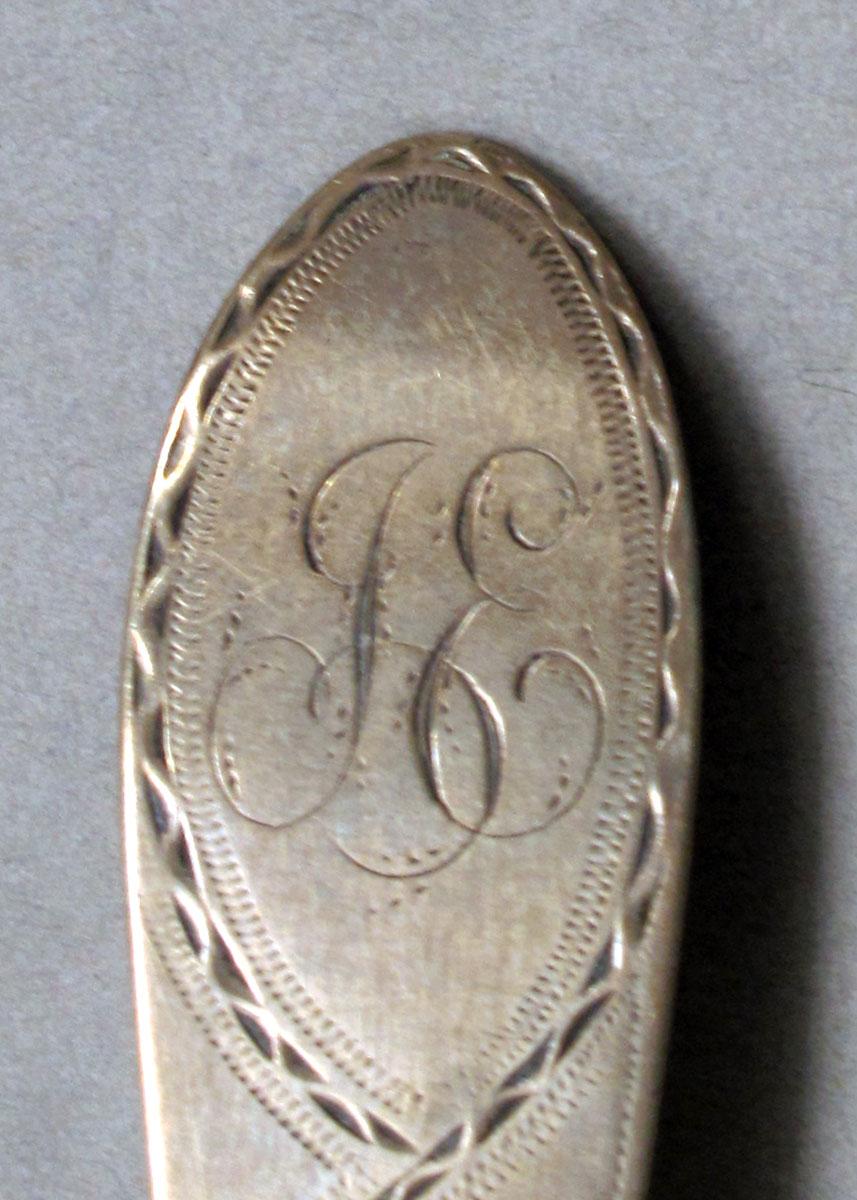 1968.0028 Silver spoon engraving