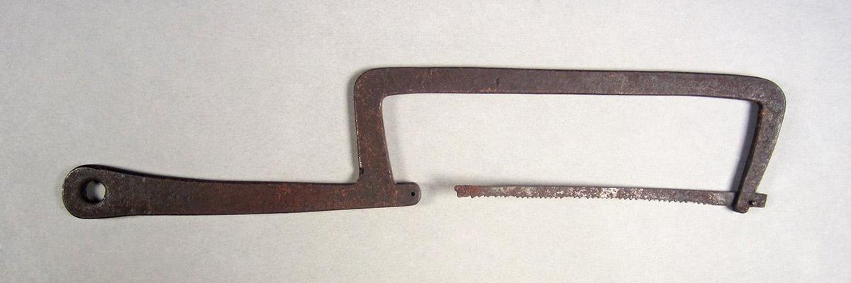 1957.0026.423, Bow saw, side 1