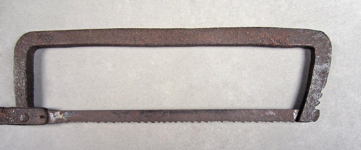 1957.0026.424, Bow saw, frame 1