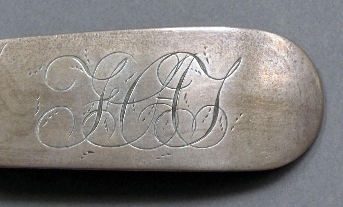 1968.0039 Silver spoon engraving