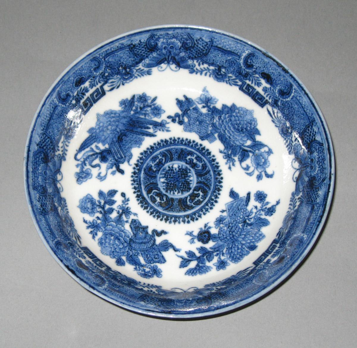 1968.0095 Porcleian saucer