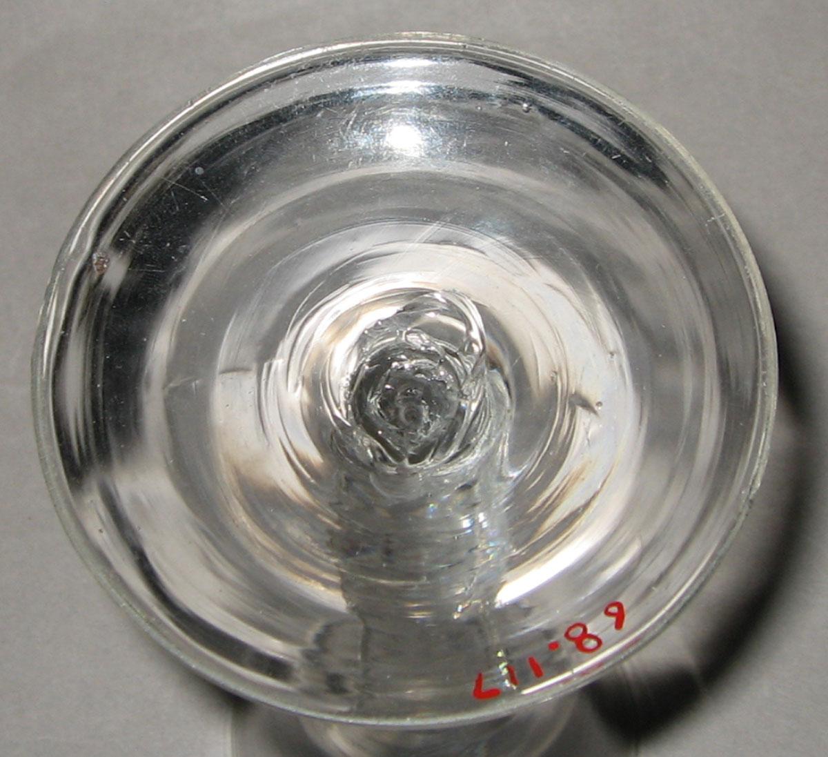 1968.0117 Glass wineglass (underside)