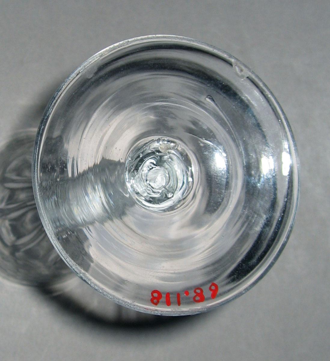 1968.0118 Glass wineglass (underside)