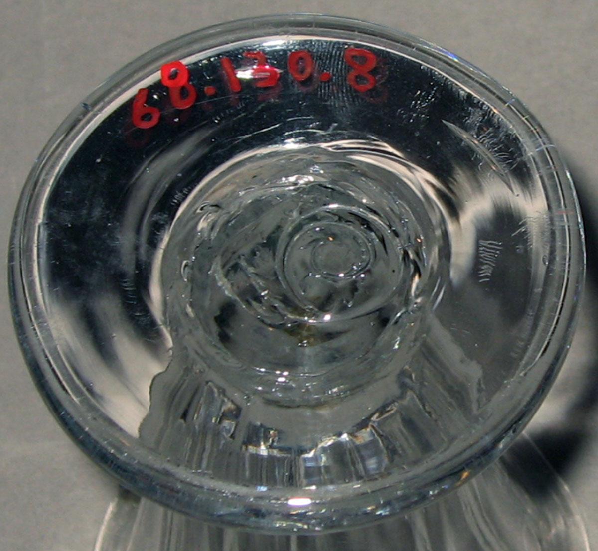 1968.0130.008 Colorless glass jelly glass (underside)