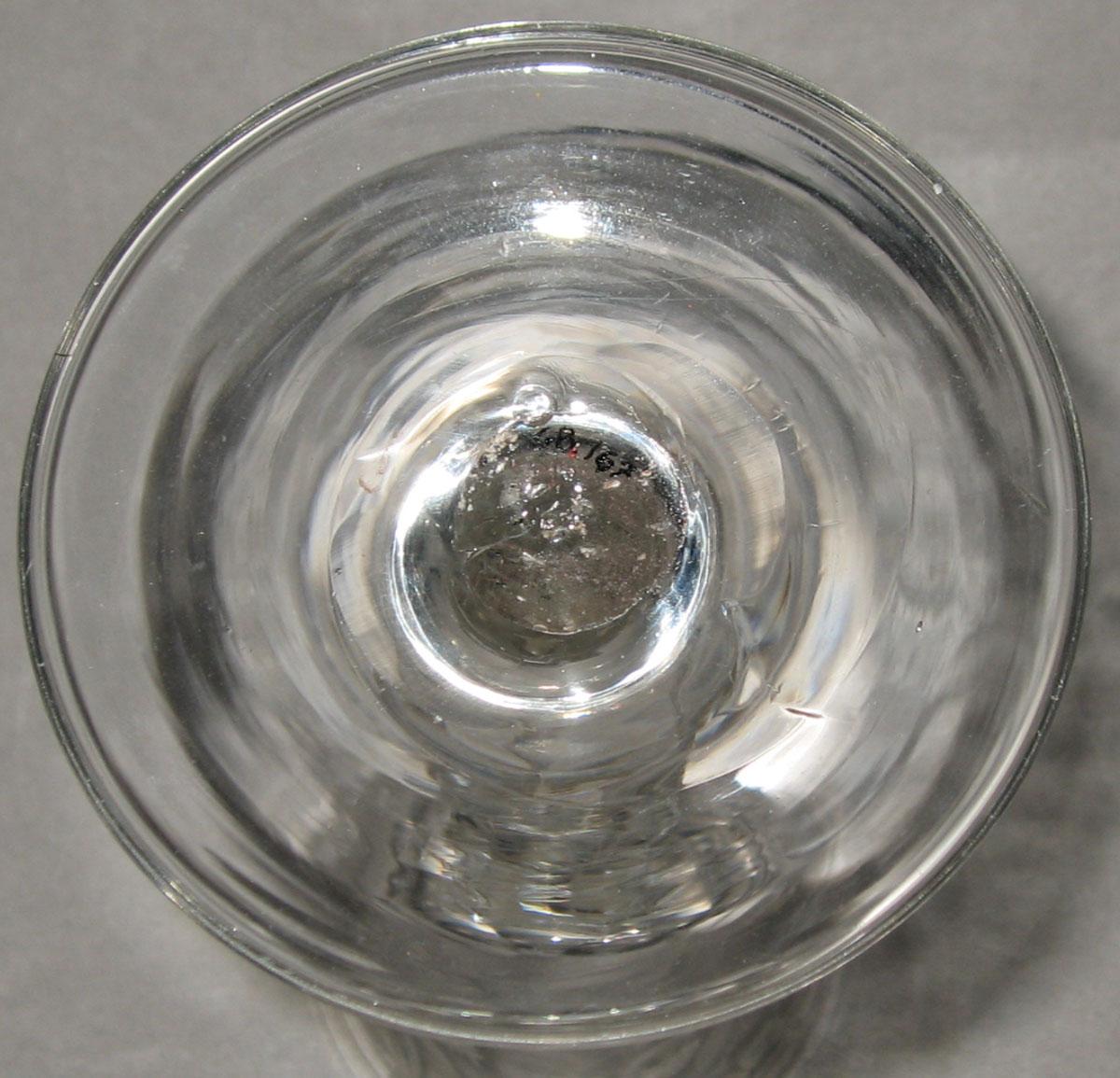 1968.0167 Lead glass wine glass (underside)