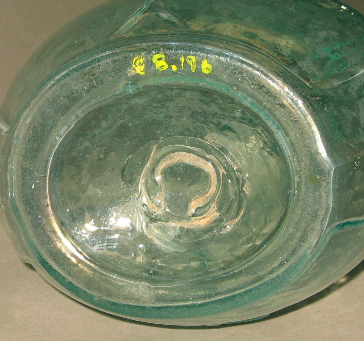 1968.0196 Glass bottle (underside)