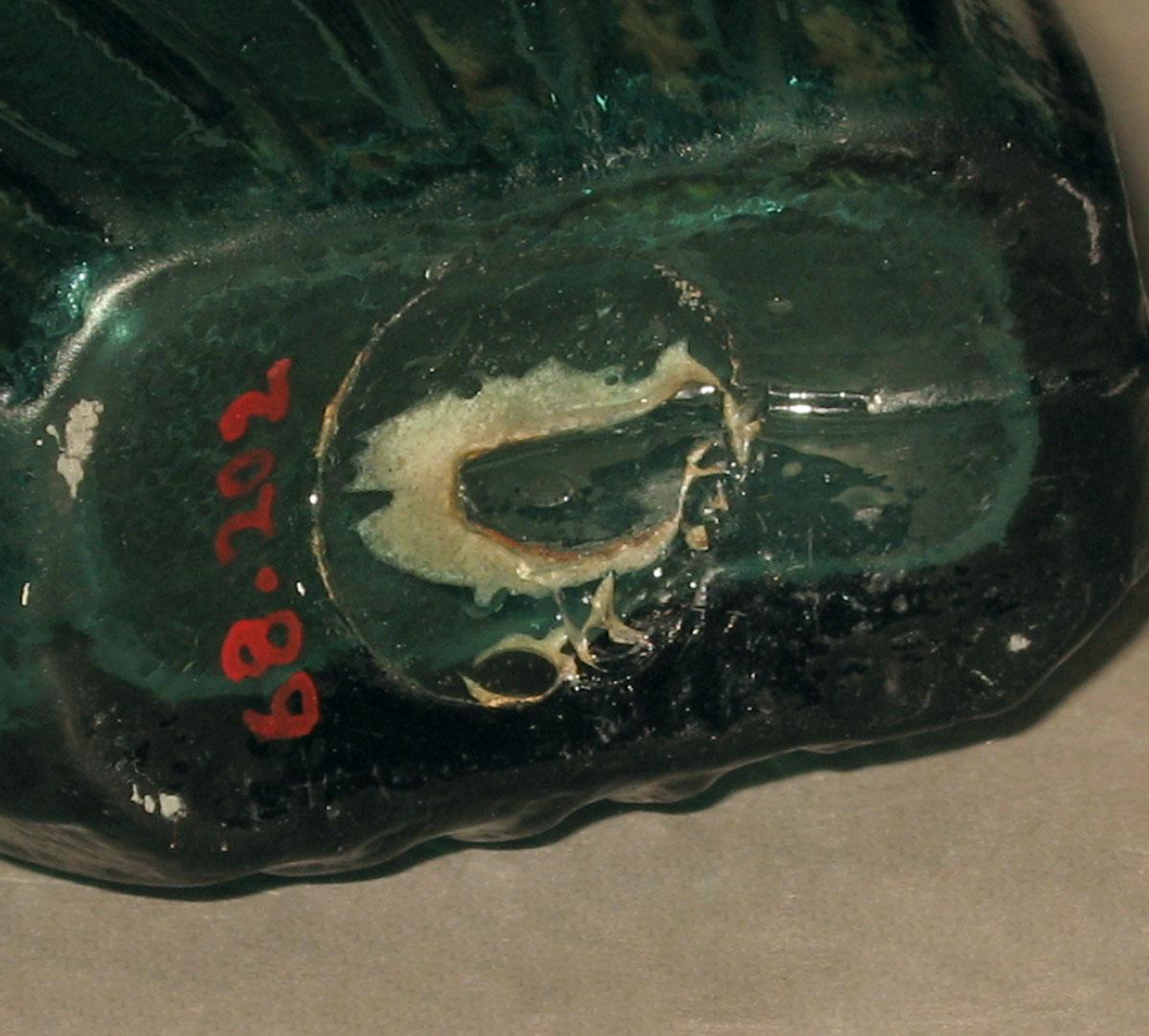1968.0202 Glass flask (underside)