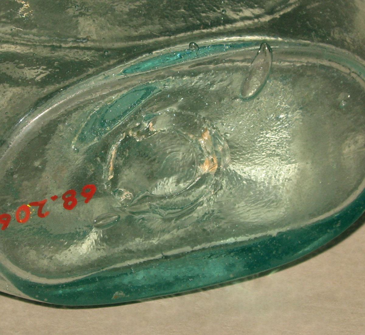 1968.0206 Glass flask (underside)