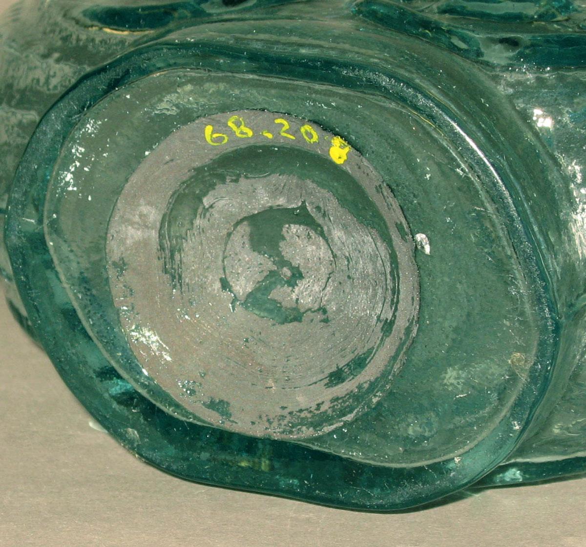 1968.0208 Glass flask (underside)