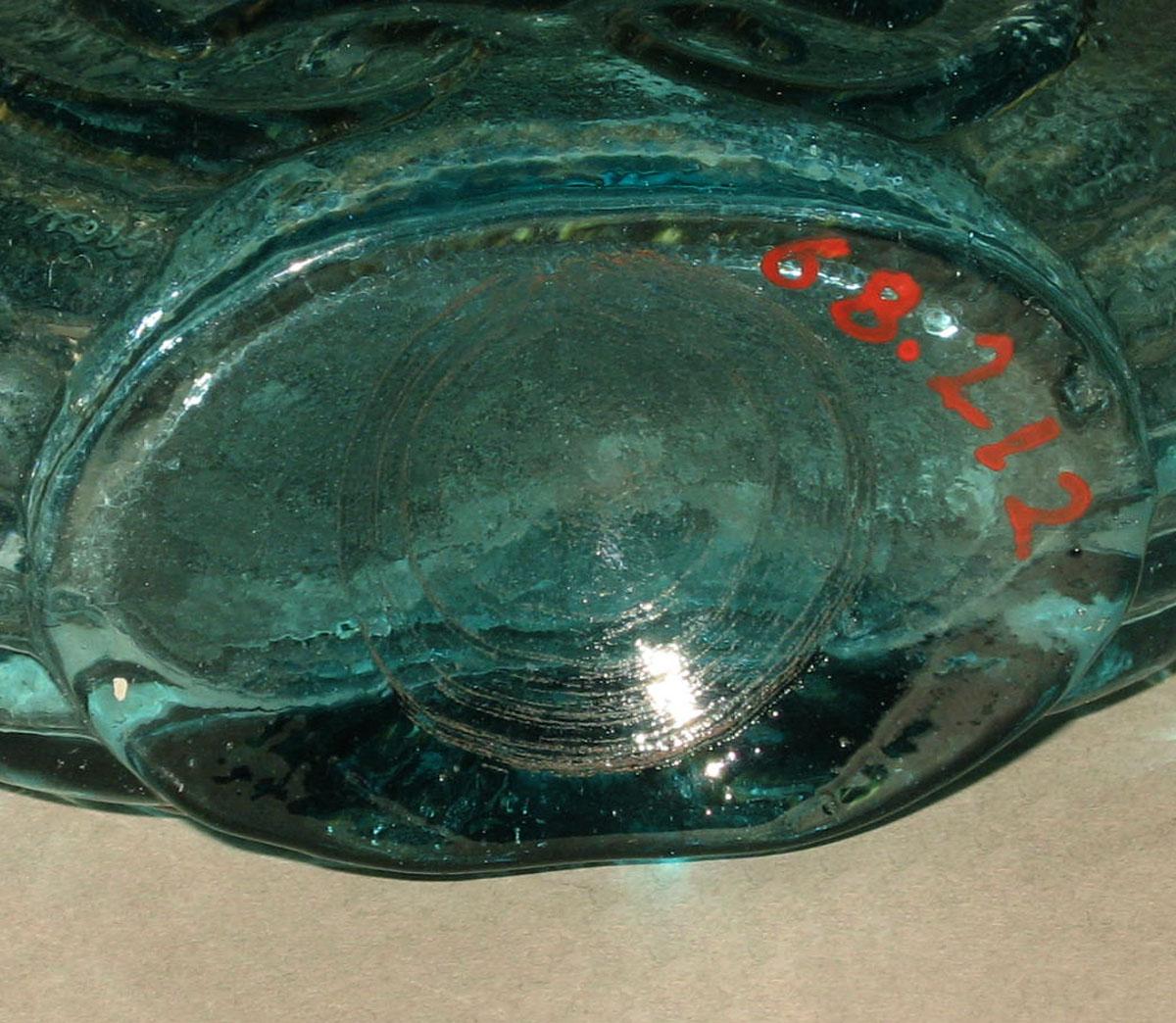 1968.0212 Glass flask (underside)