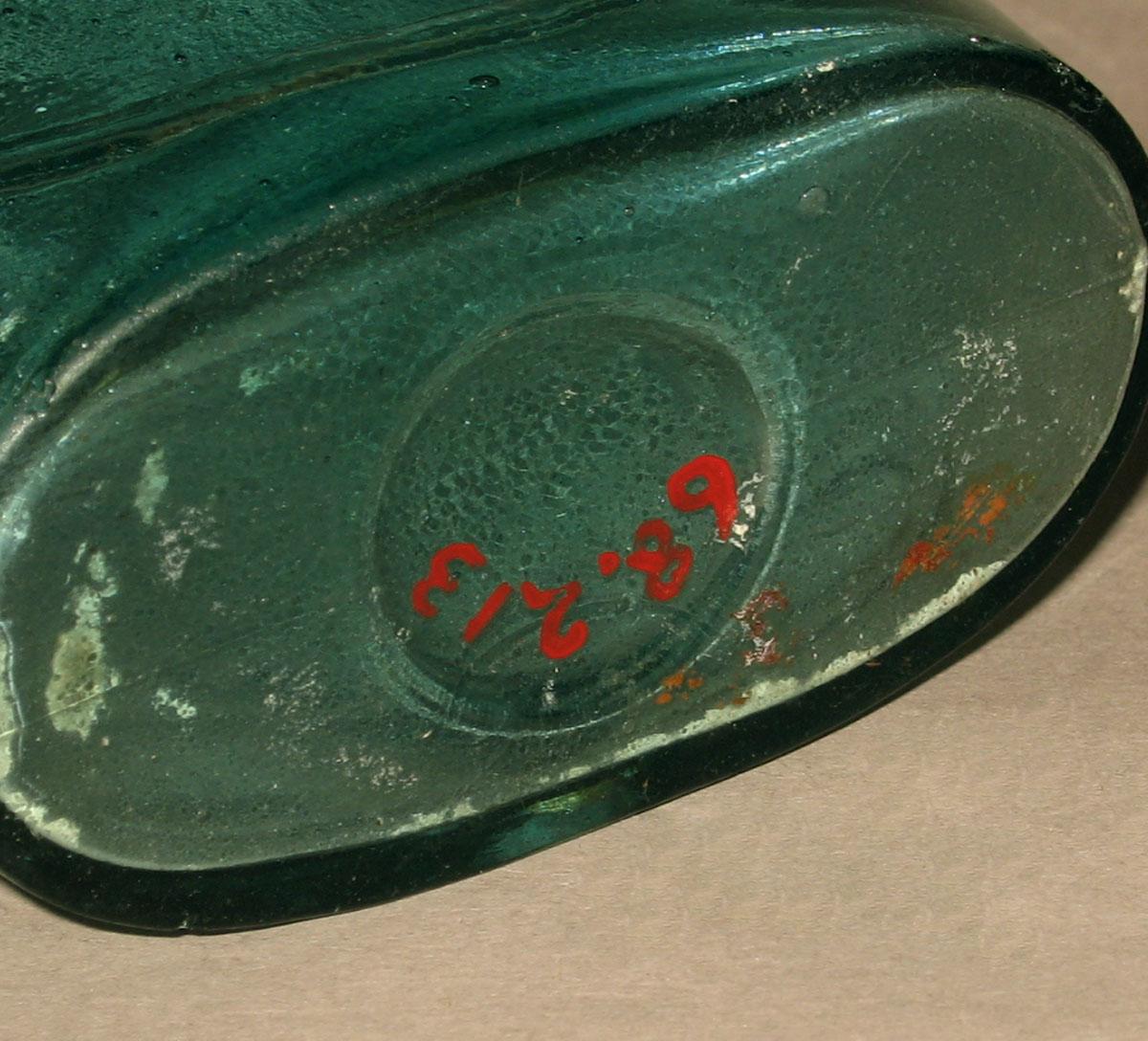 1968.0213 Glass flask (underside)