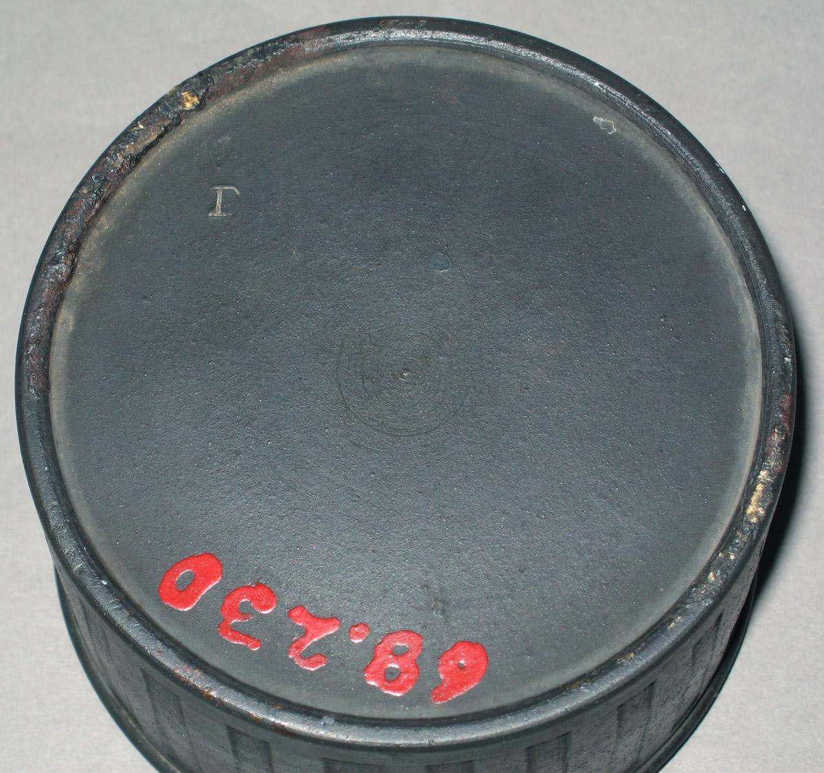 1968.0230 Black basalt inkwell (underside)