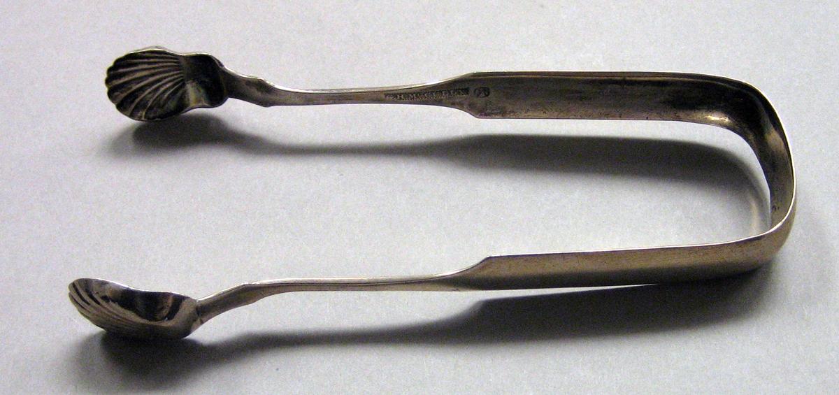 1968.0261 Silver Tongs view 1