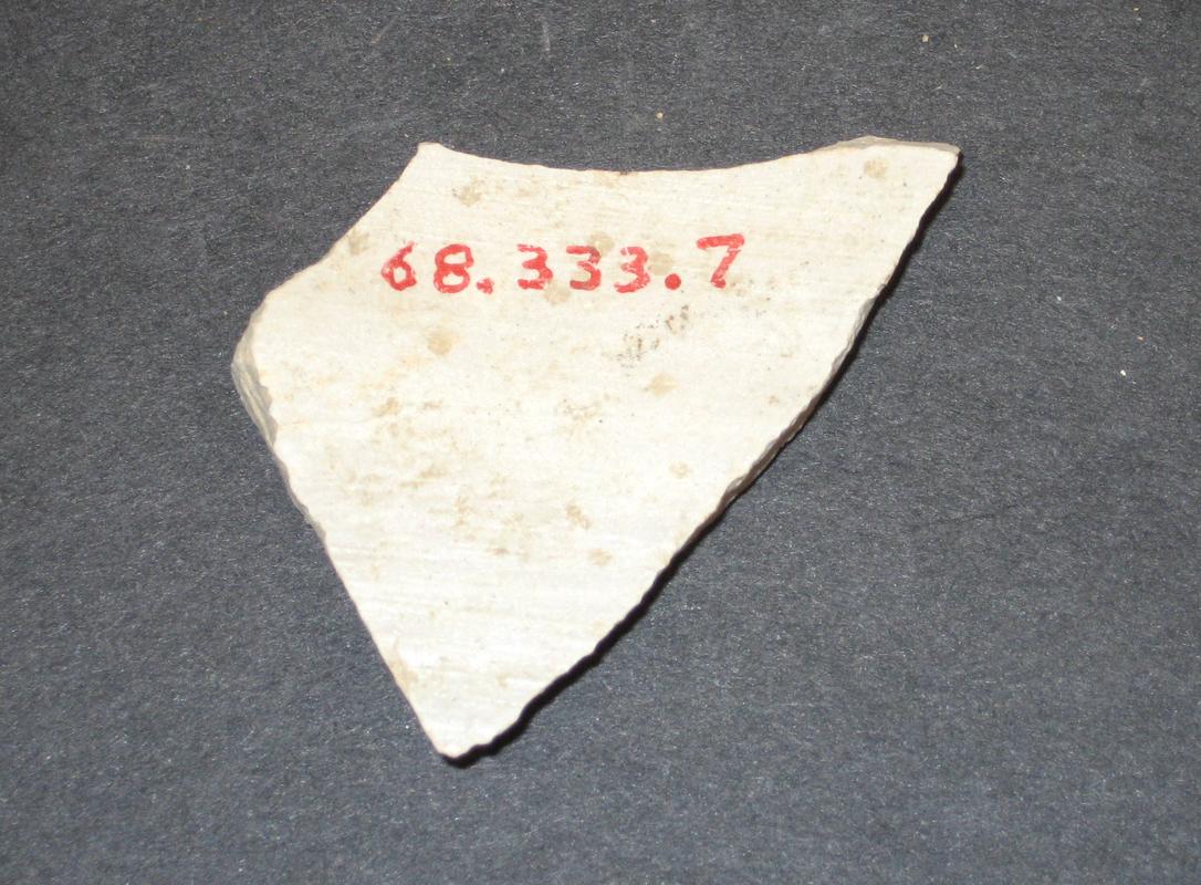 1968.0333.007 Ceramic fragment (underside)