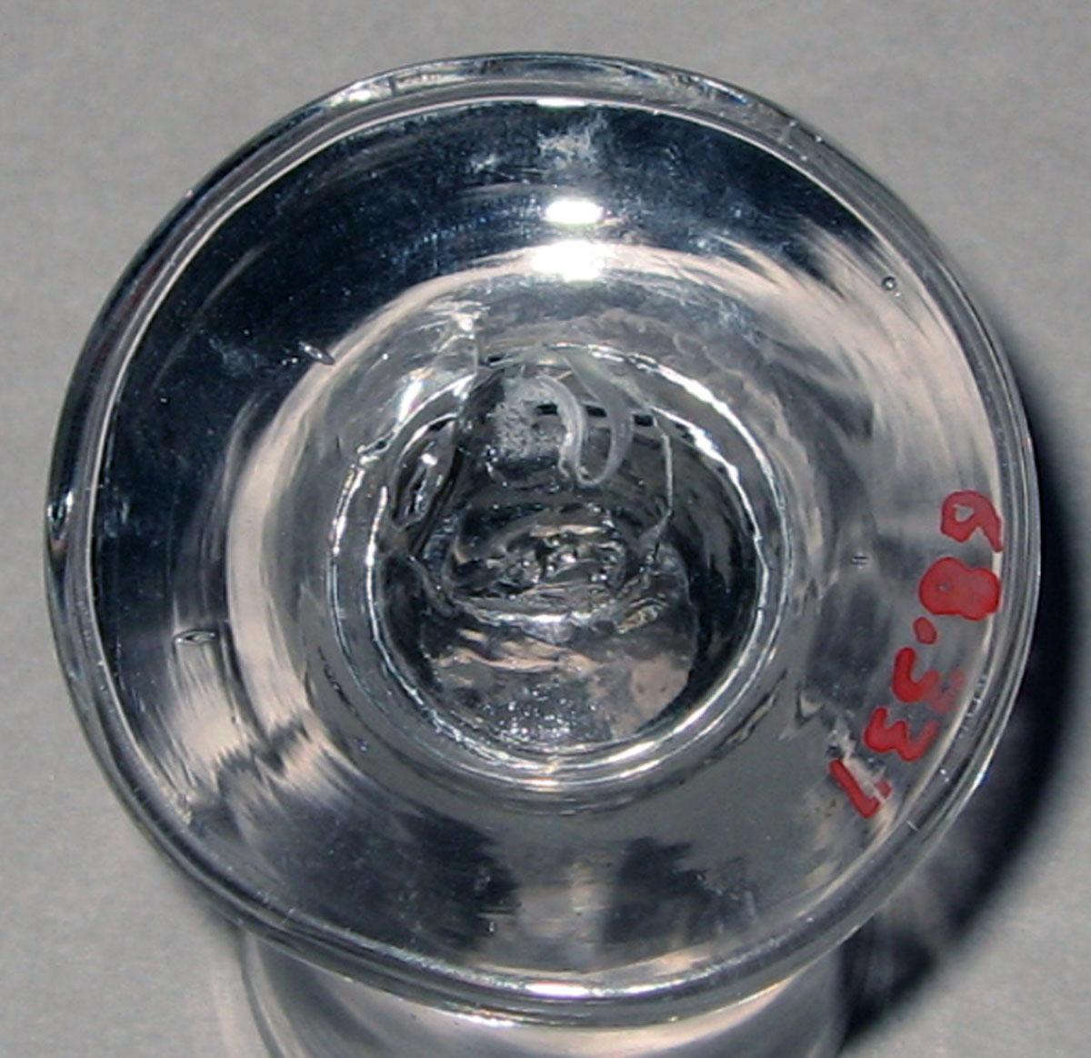 1968.0337 Glass wineglass or "deceptive" glass (underside)