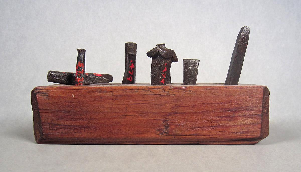 1957.0026.479 A, Holding block, side 1