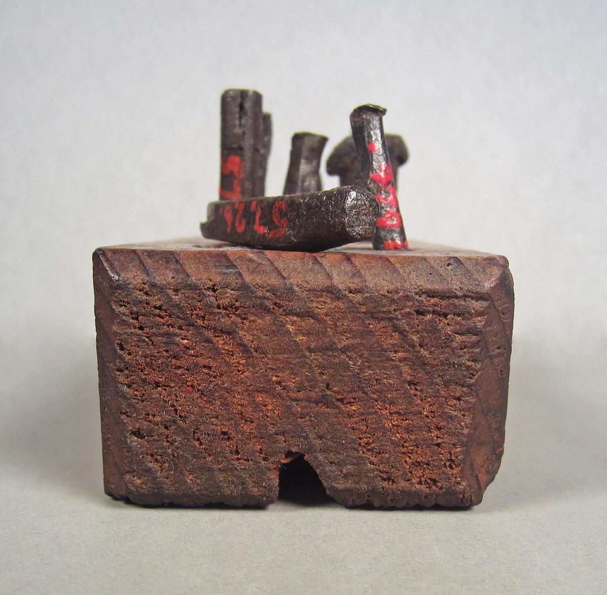 1957.0026.479 A, Holding block, side 2